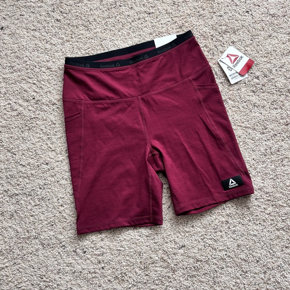 NWT Reebok Women's Burgundy Bike Shorts with side pockets M